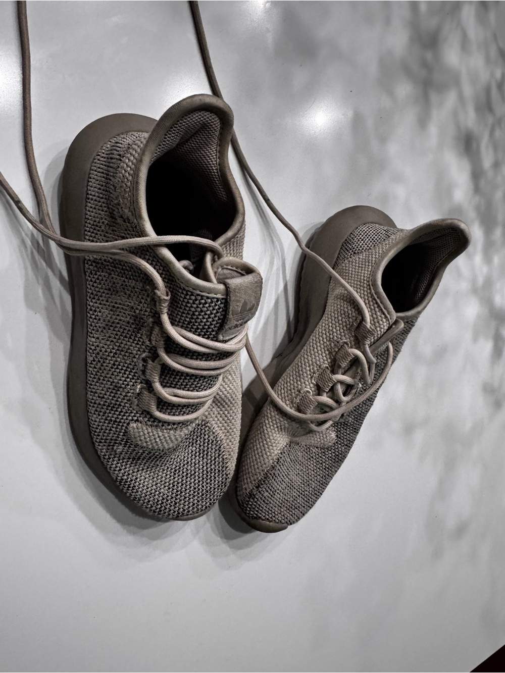 Adidas Tubular Shadow sneakers in a beige size 4